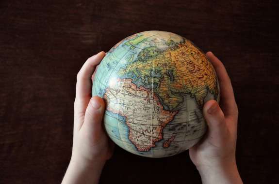 globe in hands